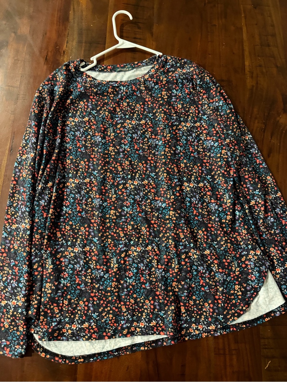 Elan Black Floral Long-Sleeve Tee with Red & Blue Accents